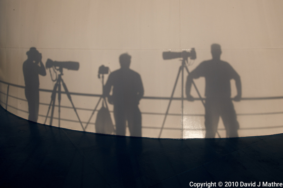 Shadow Photographers Waiting for Sunset on the M/V Explorer. Image taken with a Nikon D3x and 24 mm f/1.4G lens (ISO 100, 24 mm, f/16, 1/100 sec).
