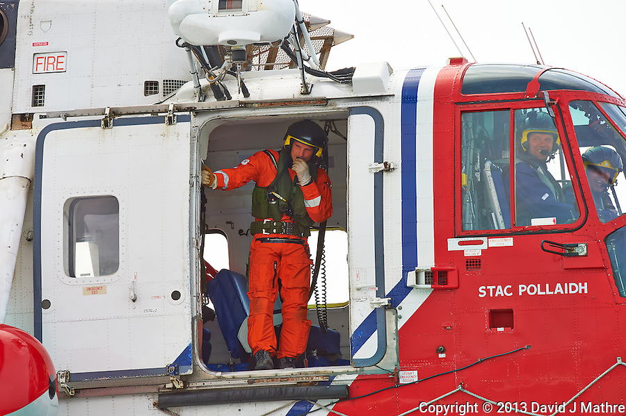 Coast Guard Rescue Helicopter (G-BIMU, Stac Pollaidh) Hovering Near the Semester at Sea M/V Explorer in the North Sea. 